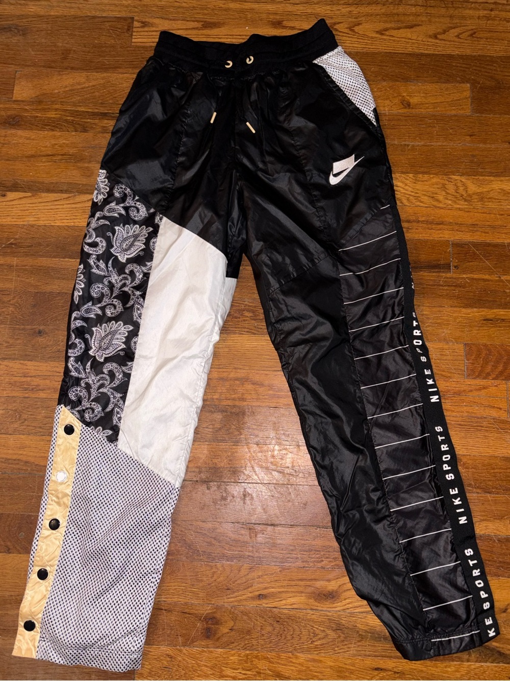 Nike Black Patchwork Joggers with White and Gold Accents